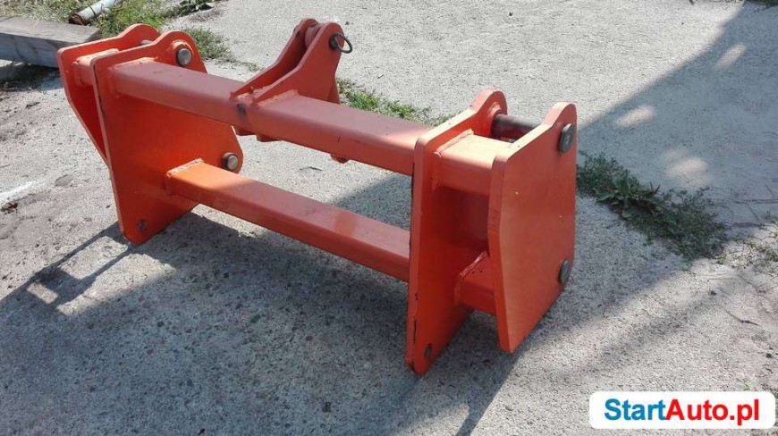 Adapter caterpillar 428 C typu TUZ do pługa szczotek itp.