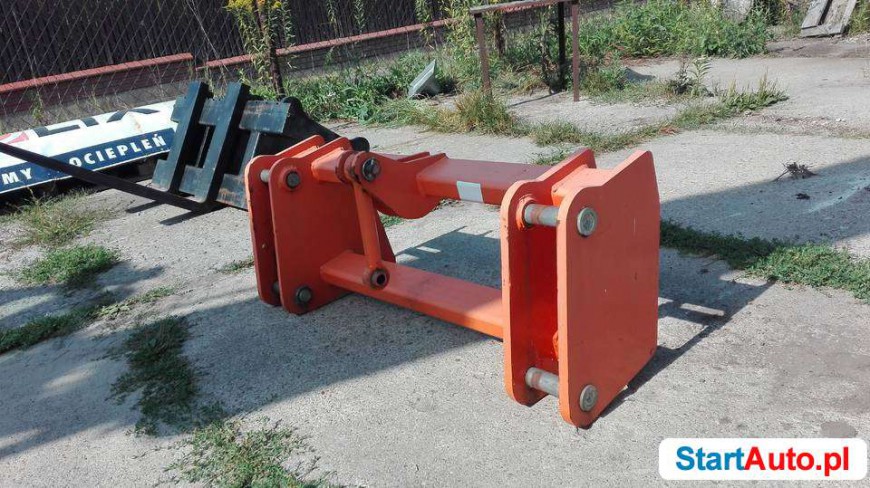 Adapter caterpillar 428 C typu TUZ do pługa szczotek itp.