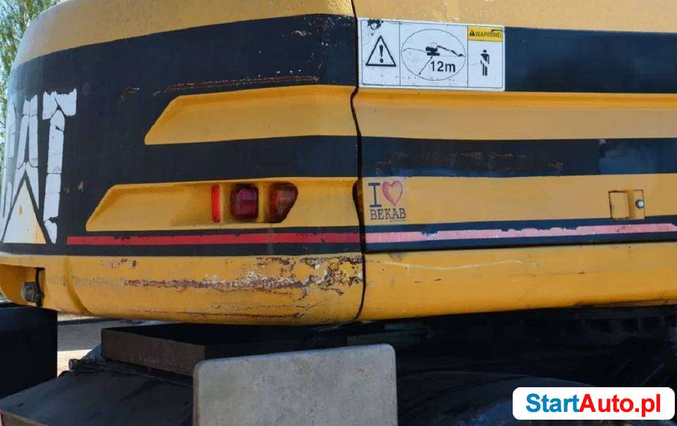 Caterpillar CAT M 315 SVA koparka kołowa z rotatorem