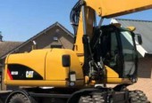 Caterpillar M 315D ramie 3x lamane koparka kolowa Cat
