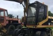 *Caterpillar M312 koparka kołowa*