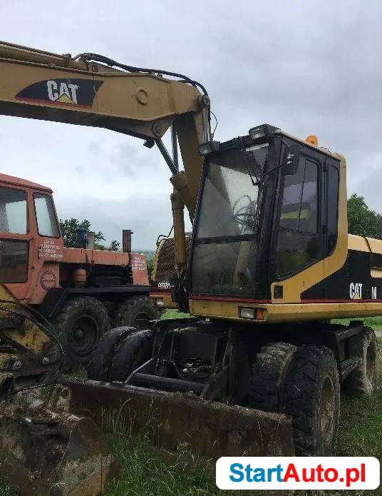 *Caterpillar M312 koparka kołowa*