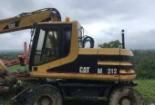 *Caterpillar M312 koparka kołowa*