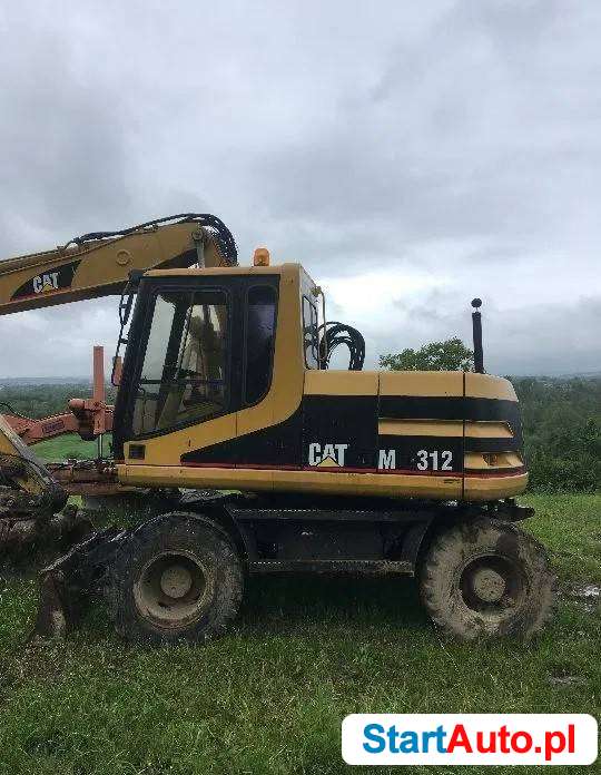 *Caterpillar M312 koparka kołowa*