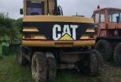 *Caterpillar M312 koparka kołowa*
