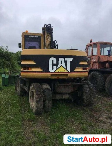 *Caterpillar M312 koparka kołowa*