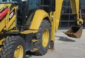 Catetpillar 428F koparko ladowarka kolowa