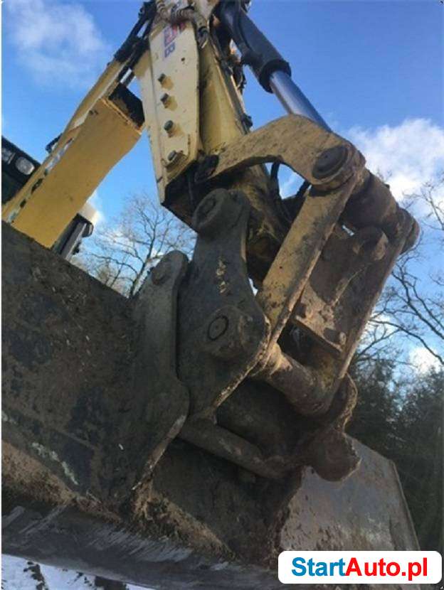 New Holland B115 CP godziny 5600 4X4 Koparko lad