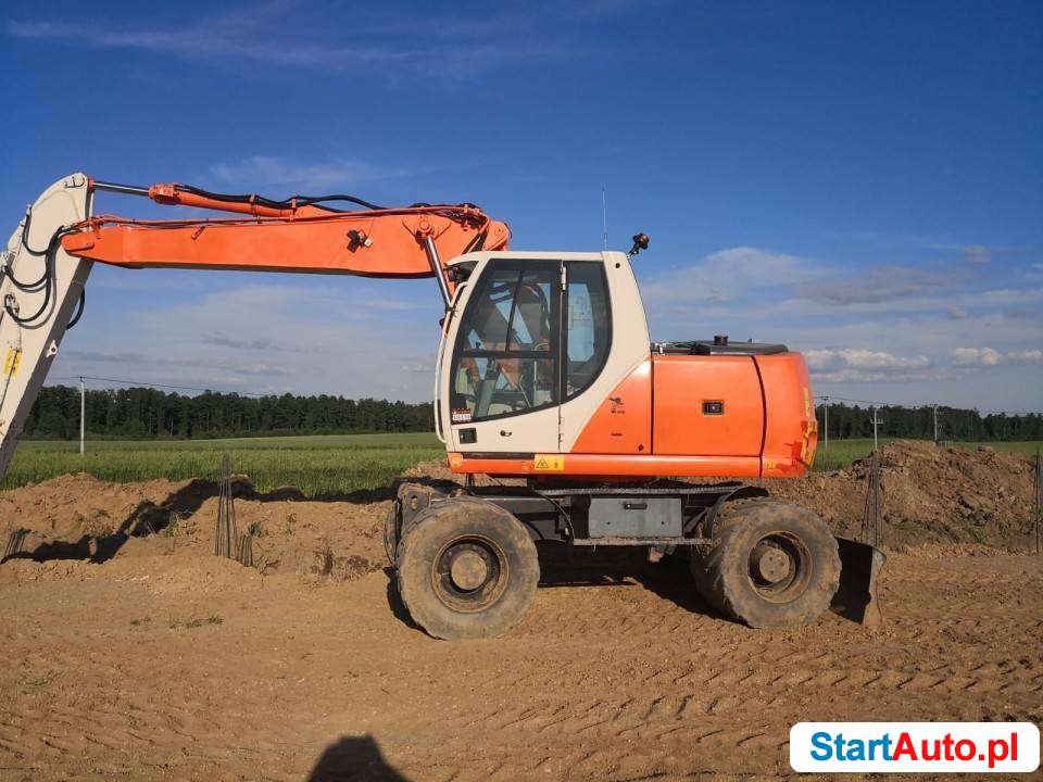 New Holland MH Plus koparka kołowa