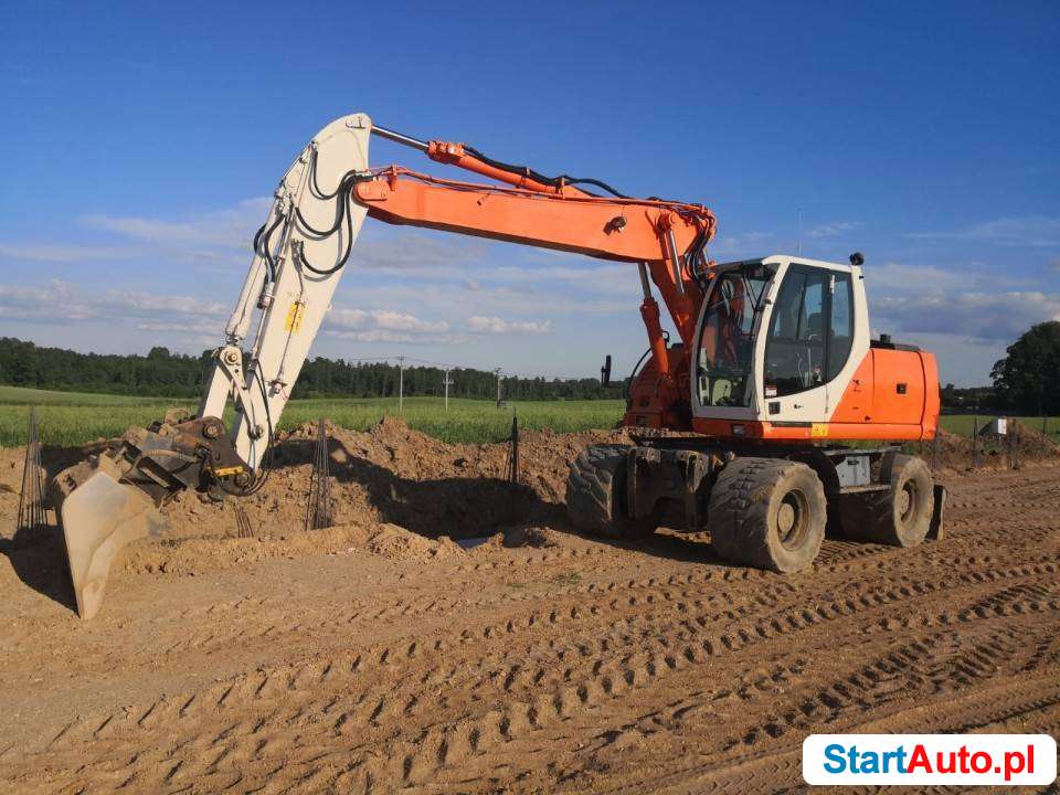 New Holland MH Plus koparka kołowa