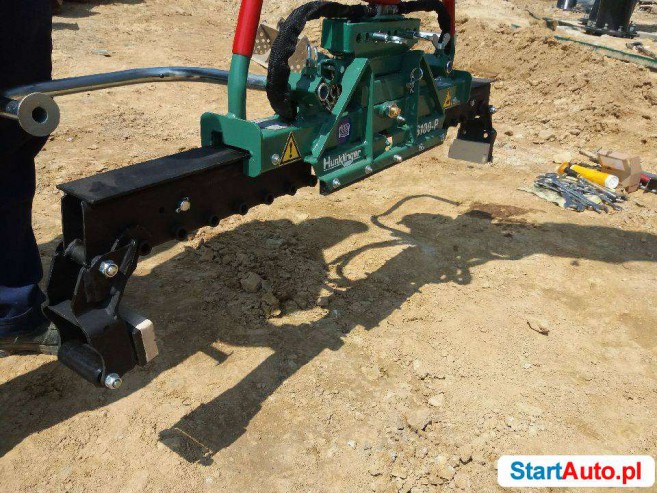 Hydrauliczny chwytak do krawężników