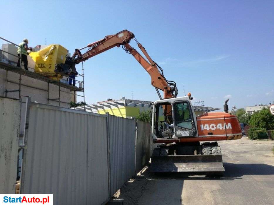 Uslugi wynajem koparka wykopy prace ziemne transport niskopdwoziem.