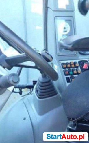 KOMATSU WB97-S-5 na duźych kolach koparko ladowarka