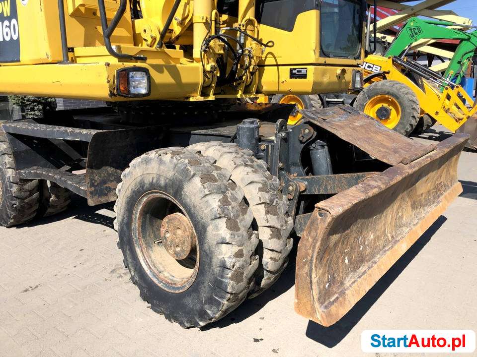 Koparka kołowa Komatsu PW160-7 – klima, podpory, 2 łyżki