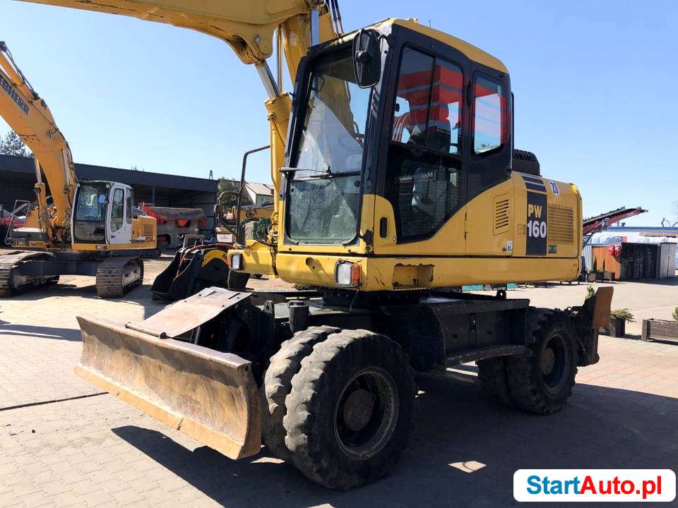 Koparka kołowa Komatsu PW160-7 – klima, podpory, 2 łyżki