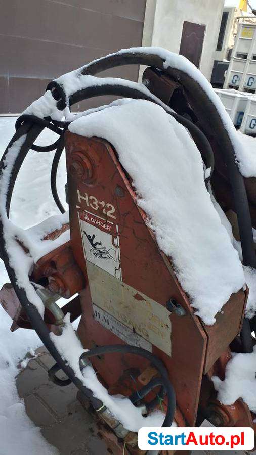 Koparka łańcuchowa Ditch Witch H312 z przyłączem do koparki