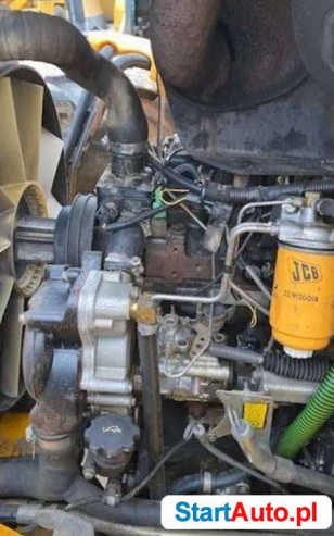 . , Koparko ladowarka kolowa na duzych kolach JCB 4CX