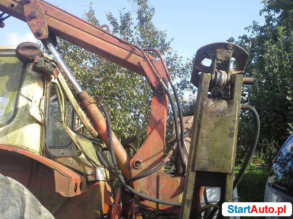 Sprzedam osprzęt koparko spycharki Belarus.