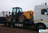 Transport maszyn budowlanych koparek ładowarek