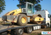 Transport maszyn budowlanych koparek ładowarek