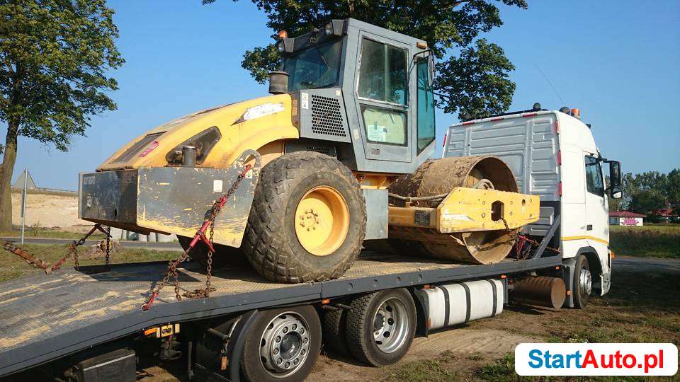 Transport maszyn budowlanych koparek ładowarek